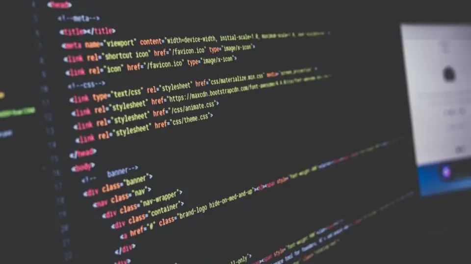 A dark editor window showing the HTML head of a page, with several stylesheet link tags visible.